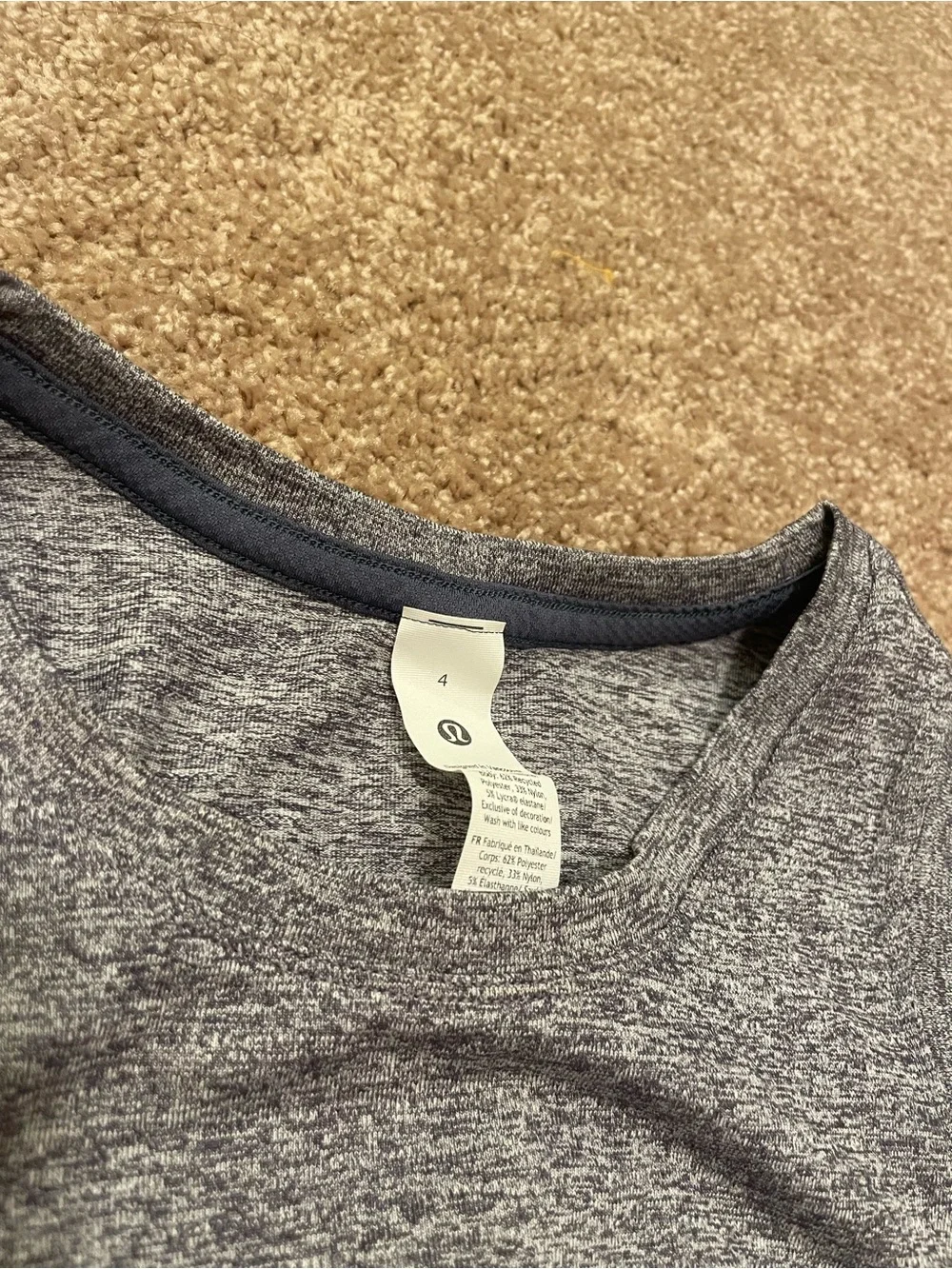 Lululemon License to Train Tight-Fit tank in heathered true navy color